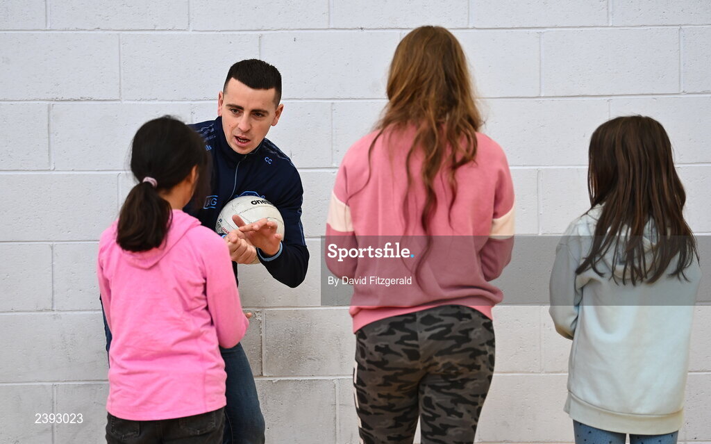 7 December 2022; Dublin footballer Cormac Costello during a training session for students of Tyrrelstown Educate Together National School. As proud sponsors of Dublin GAA, AIG are encouraging participation in GAA around Dublin through its Diversity, Equality and Inclusion Roadshow (DEI Roadshow) at Tyrellstown ETNS in Dublin. Photo by David Fitzgerald/Sportsfile