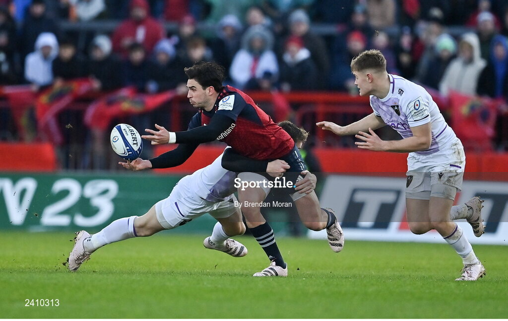 14 January 2023; Joey Carbery of Munster is tackled by Rory Hutchinson during the Heineken Champions Cup Pool B Round 3 match between Munster and Northampton Saints at Thomond Park in Limerick. Photo by Brendan Moran/Sportsfile
