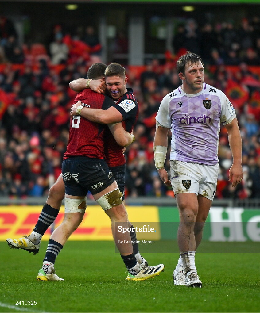 14 January 2023; Jack O’Donoghue of Munster, left, celebrates with team-mate Jack Crowley after scoring their side's second try during the Heineken Champions Cup Pool B Round 3 match between Munster and Northampton Saints at Thomond Park in Limerick. Photo by Brendan Moran/Sportsfile