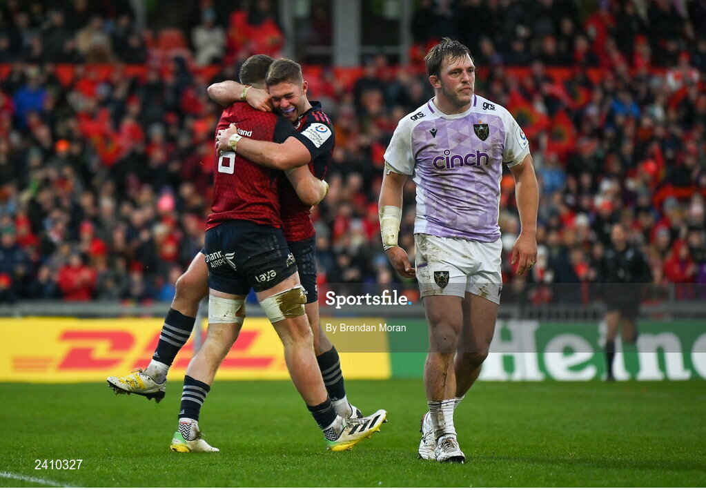 14 January 2023; Jack O’Donoghue of Munster, left, celebrates with team-mate Jack Crowley after scoring their side's second try during the Heineken Champions Cup Pool B Round 3 match between Munster and Northampton Saints at Thomond Park in Limerick. Photo by Brendan Moran/Sportsfile