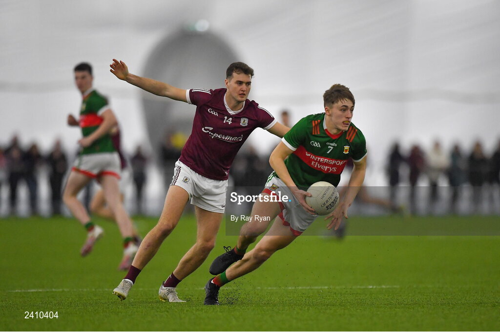 14 January 2023; Donnacha McHugh of Mayo in action against Robert Finnerty of Galway during the Connacht FBD League Semi-Final match between Mayo and Galway at NUI Galway Connacht GAA Air Dome in Bekan, Mayo. Photo by Ray Ryan/Sportsfile