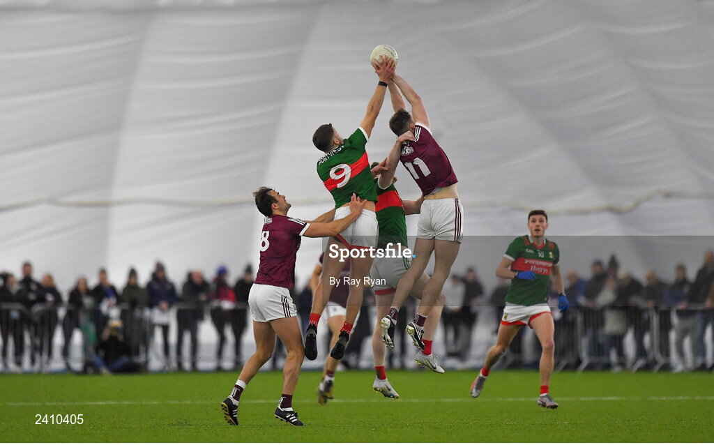 14 January 2023; Matthew Barrett and Mathew Tierney of Galway in action against Jordan Flynn and Matthew Ruane of Mayo during the Connacht FBD League Semi-Final match between Mayo and Galway at NUI Galway Connacht GAA Air Dome in Bekan, Mayo. Photo by Ray Ryan/Sportsfile