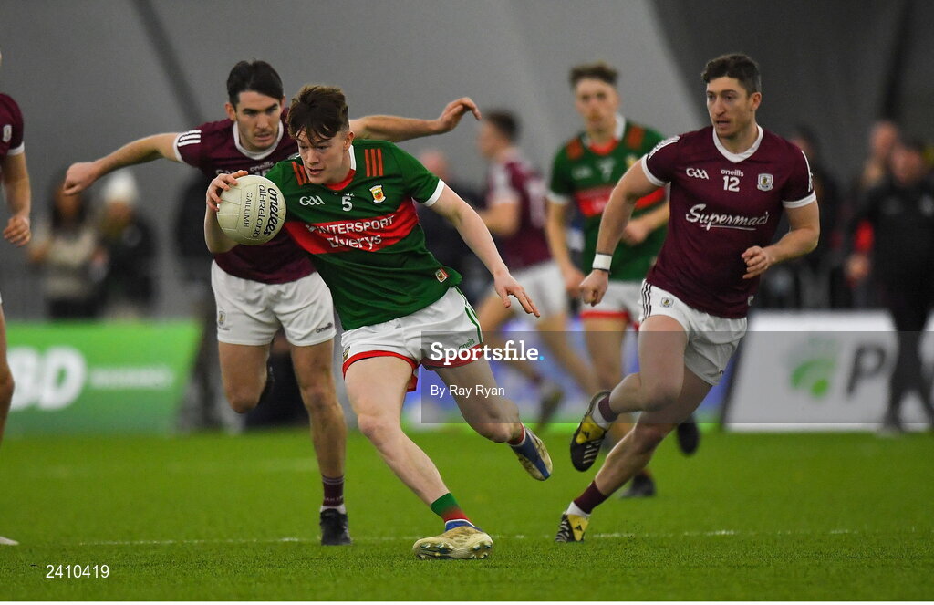 14 January 2023; Fenton Kelly of Mayo in action against Barry McHugh of Galway during the Connacht FBD League Semi-Final match between Mayo and Galway at NUI Galway Connacht GAA Air Dome in Bekan, Mayo. Photo by Ray Ryan/Sportsfile