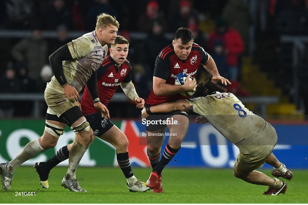14 January 2023; Niall Scannell of Munster is tackled by Lewis Ludlam of Northampton Saints during the Heineken Champions Cup Pool B Round 3 match between Munster and Northampton Saints at Thomond Park in Limerick. Photo by Brendan Moran/Sportsfile