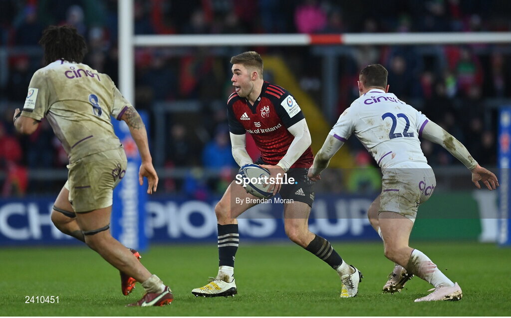 14 January 2023; Jack Crowley of Munster in action against Lewis Ludlam and Fraser Dingwall of Northampton Saints during the Heineken Champions Cup Pool B Round 3 match between Munster and Northampton Saints at Thomond Park in Limerick. Photo by Brendan Moran/Sportsfile