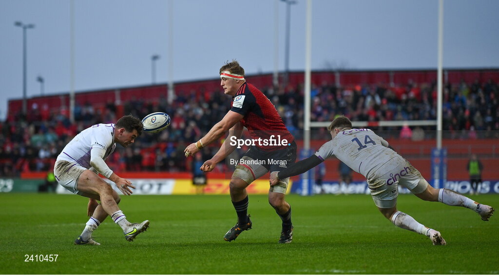 14 January 2023; Gavin Coombes of Munster passes inside to team-mate Jack O'Donoghue, not pictured, in the lead up to their side's second try during the Heineken Champions Cup Pool B Round 3 match between Munster and Northampton Saints at Thomond Park in Limerick. Photo by Brendan Moran/Sportsfile
