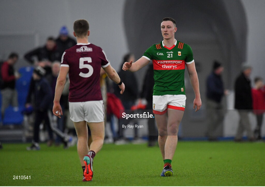 14 January 2023; Gavin Durcan of Mayo shake hands with Dylan McHugh of Galway after the Connacht FBD League Semi-Final match between Mayo and Galway at NUI Galway Connacht GAA Air Dome in Bekan, Mayo. Photo by Ray Ryan/Sportsfile