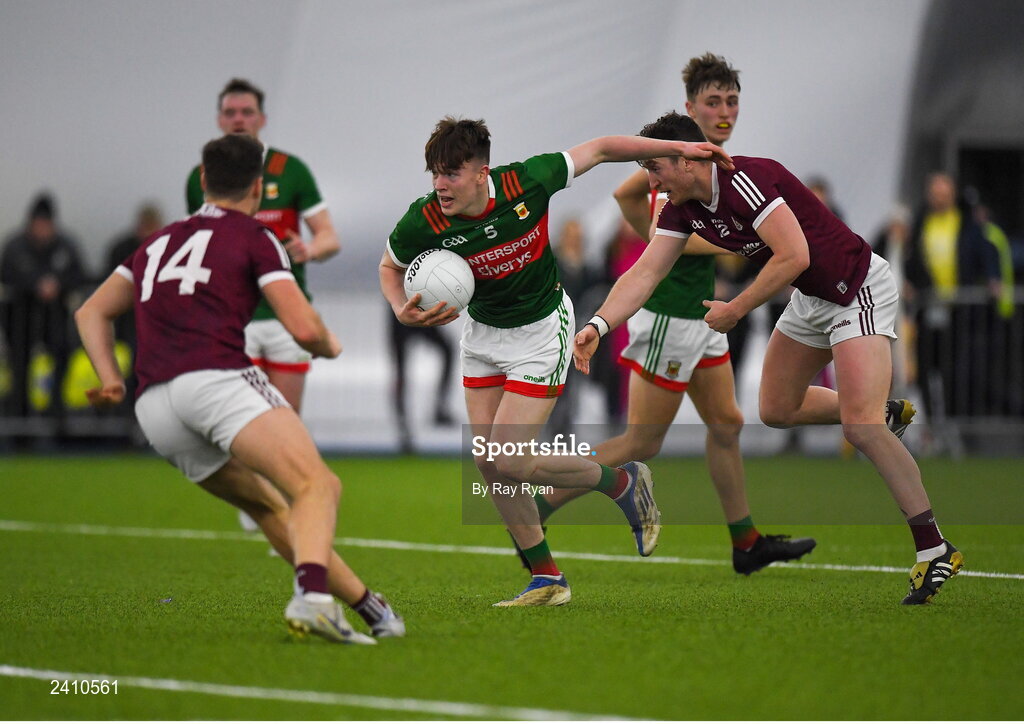 14 January 2023; Fenton Kelly of Mayo in action against Johnny Heaney of Galway during the Connacht FBD League Semi-Final match between Mayo and Galway at NUI Galway Connacht GAA Air Dome in Bekan, Mayo. Photo by Ray Ryan/Sportsfile
