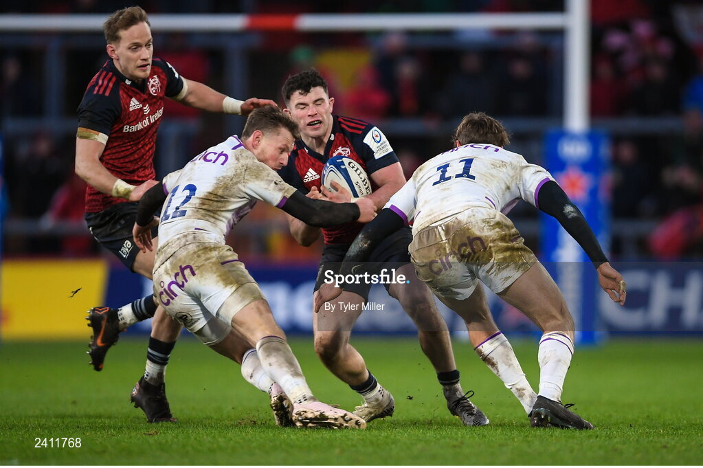 14 January 2023; Calvin Nash of Munster is tackled by Rory Hutchinson of Northampton Saints during the Heineken Champions Cup Pool B Round 3 match between Munster and Northampton Saints at Thomond Park in Limerick. Photo by Tyler Miller/Sportsfile