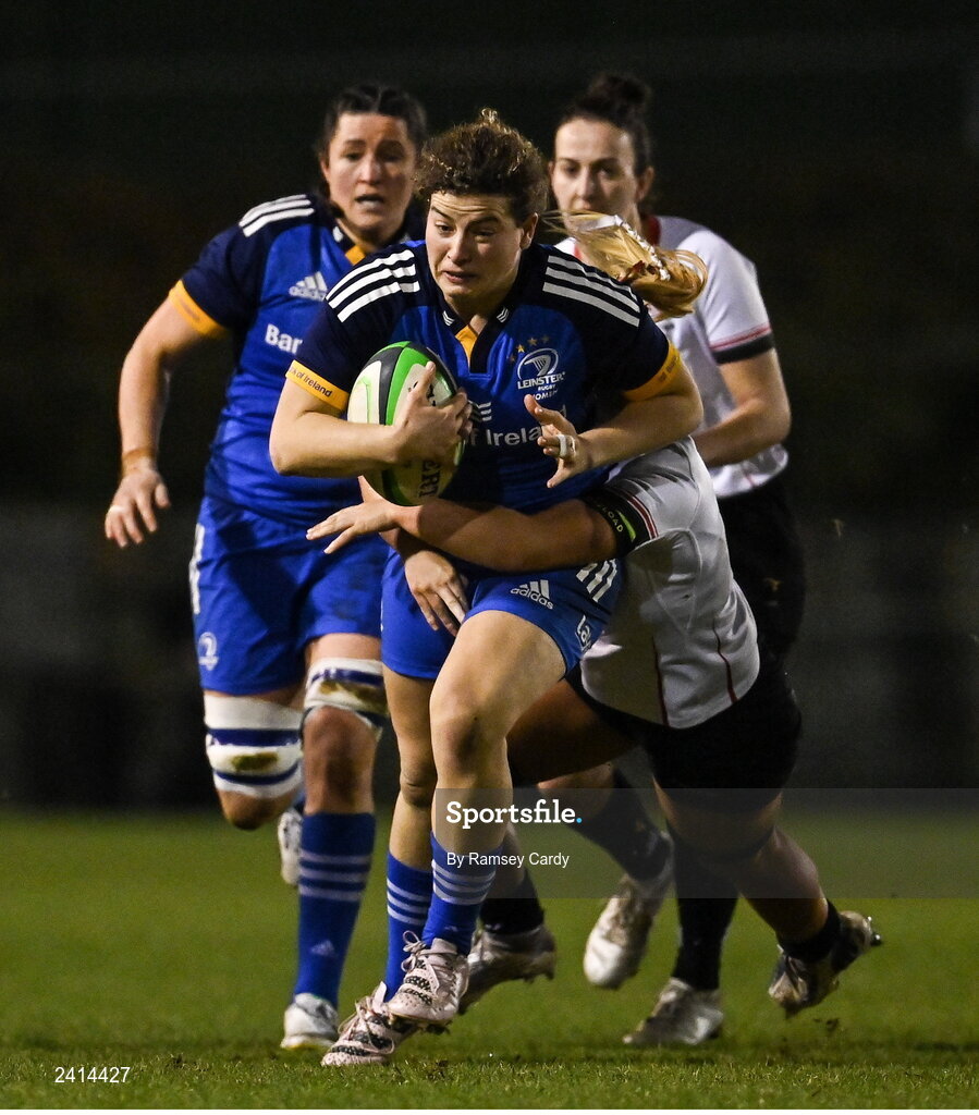 21 January 2023; Jenny Murphy of Leinster is tackled by Brenda Barr, left, and India Daley of Ulster during the Vodafone Women’s Interprovincial Championship Round Three match between Ulster and Leinster at Queen’s Sport in Belfast. Photo by Ramsey Cardy/Sportsfile