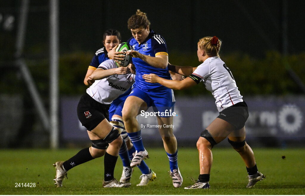 21 January 2023; Jenny Murphy of Leinster is tackled by Brenda Barr, left, and India Daley of Ulster during the Vodafone Women’s Interprovincial Championship Round Three match between Ulster and Leinster at Queen’s Sport in Belfast. Photo by Ramsey Cardy/Sportsfile