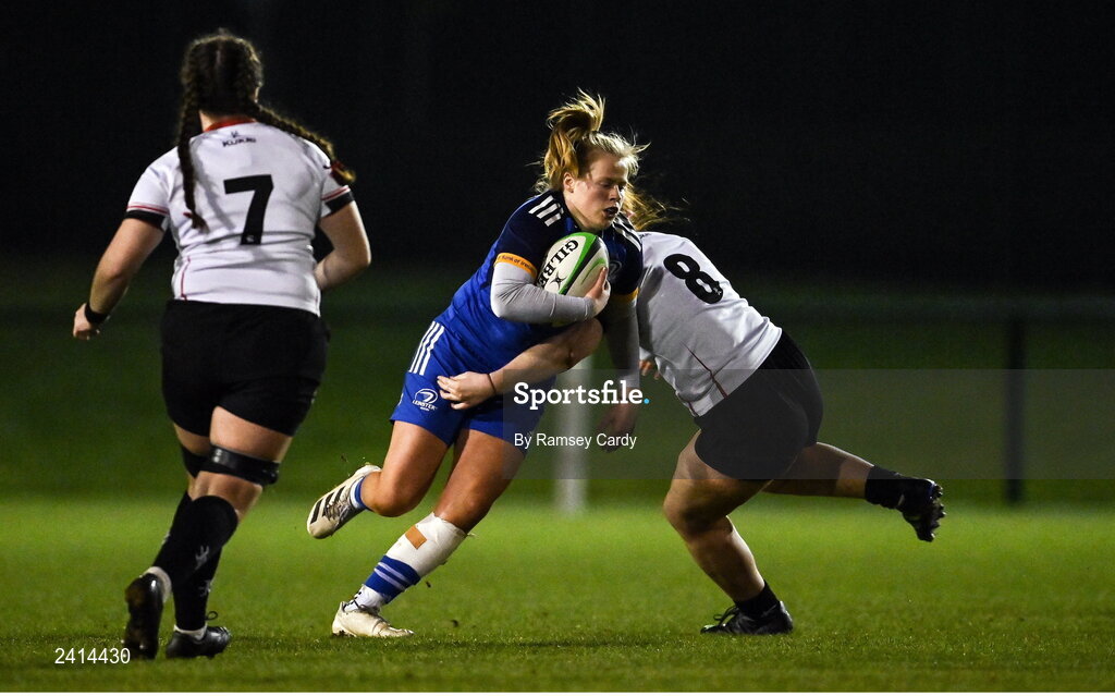 21 January 2023; Dannah O'Brien of Leinster is tackled by Sophie Barrett of Ulster during the Vodafone Women’s Interprovincial Championship Round Three match between Ulster and Leinster at Queen’s Sport in Belfast. Photo by Ramsey Cardy/Sportsfile