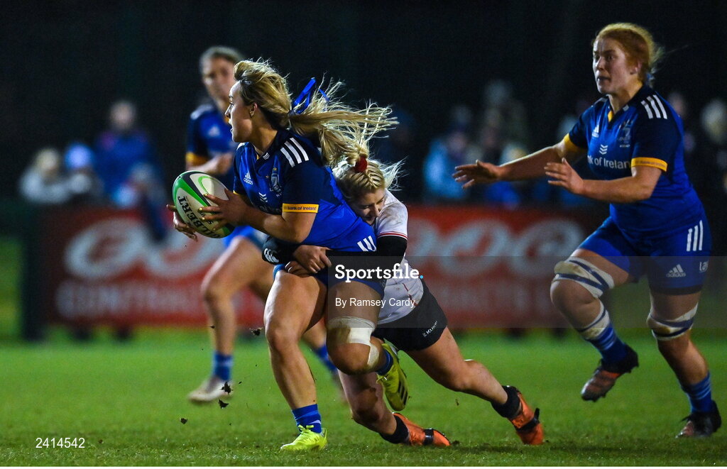 21 January 2023; Aoife Dalton of Leinster is tackled by Emma Jordan of Ulster during the Vodafone Women’s Interprovincial Championship Round Three match between Ulster and Leinster at Queen’s Sport in Belfast. Photo by Ramsey Cardy/Sportsfile