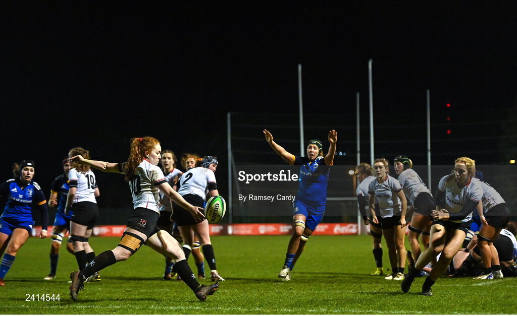 21 January 2023; Ella Durkan of Ulster clears under pressure from Aoife McDermott of Leinster during the Vodafone Women’s Interprovincial Championship Round Three match between Ulster and Leinster at Queen’s Sport in Belfast. Photo by Ramsey Cardy/Sportsfile
