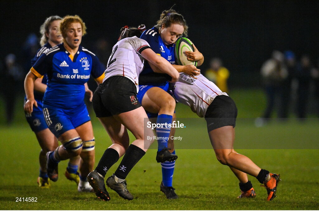 21 January 2023; Lisa Mullen of Leinster is tackled by Megan Simpson of Ulster during the Vodafone Women’s Interprovincial Championship Round Three match between Ulster and Leinster at Queen’s Sport in Belfast. Photo by Ramsey Cardy/Sportsfile
