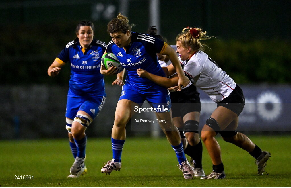 21 January 2023; Jenny Murphy of Leinster is tackled by Brenda Barr, left, and India Daley of Ulster during the Vodafone Women’s Interprovincial Championship Round Three match between Ulster and Leinster at Queen’s Sport in Belfast. Photo by Ramsey Cardy/Sportsfile