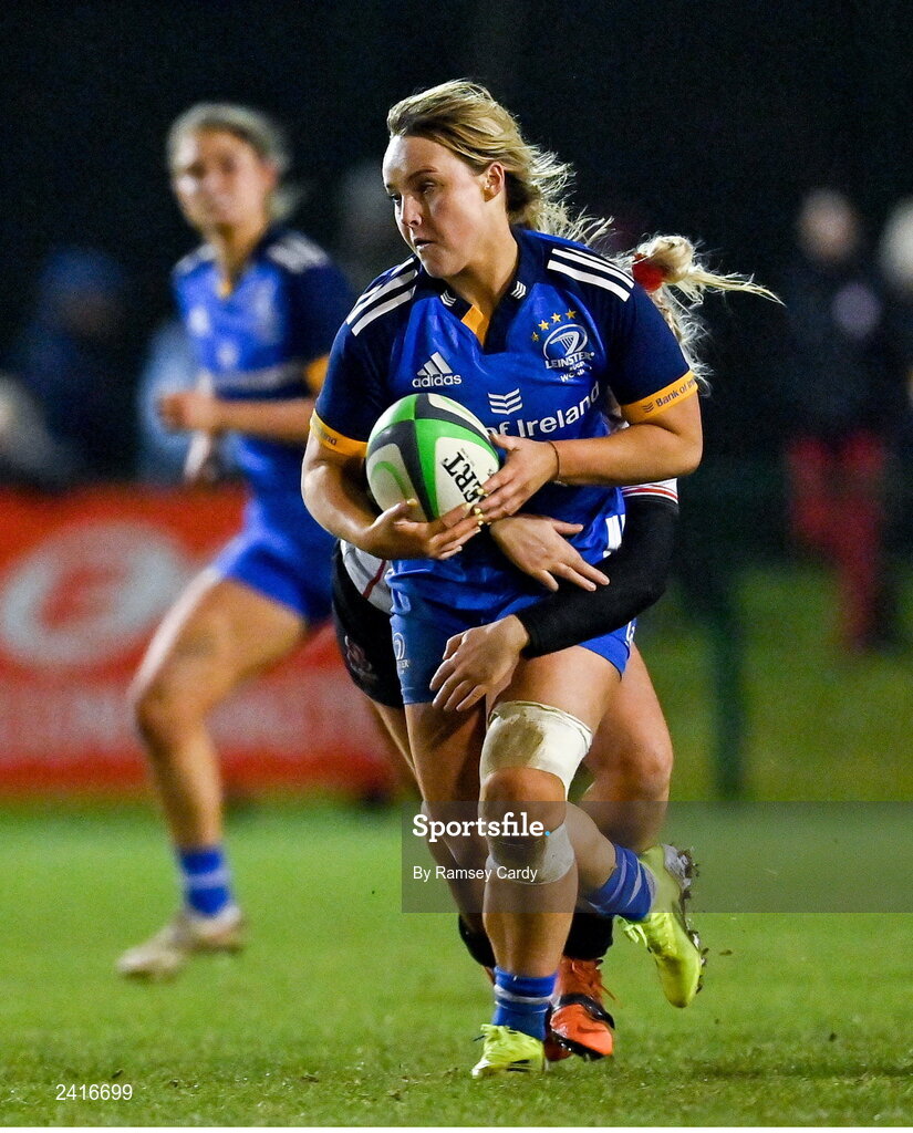 21 January 2023; Aoife Dalton of Leinster is tackled by Emma Jordan of Ulster during the Vodafone Women’s Interprovincial Championship Round Three match between Ulster and Leinster at Queen’s Sport in Belfast. Photo by Ramsey Cardy/Sportsfile