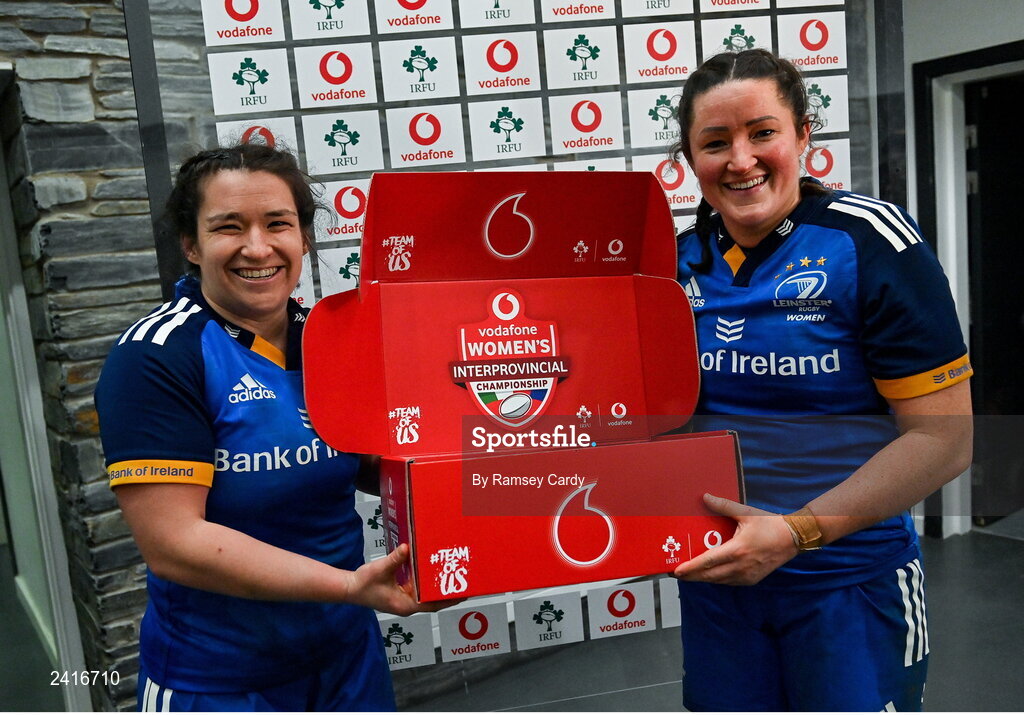 21 January 2023; Hannah O'Connor of Leinster is presented the player of the match award by Leinster captain Christy Haney, left, after the Vodafone Women’s Interprovincial Championship Round Three match between Ulster and Leinster at Queen’s Sport in Belfast. Photo by Ramsey Cardy/Sportsfile