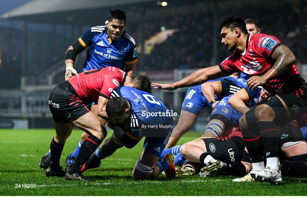 28 January 2023; Max Deegan of Leinster on his way to scoring his side's first try despite the tackle of Jarrod Evans of Cardiff during the United Rugby Championship match between Leinster and Cardiff at RDS Arena in Dublin. Photo by Harry Murphy/Sportsfile