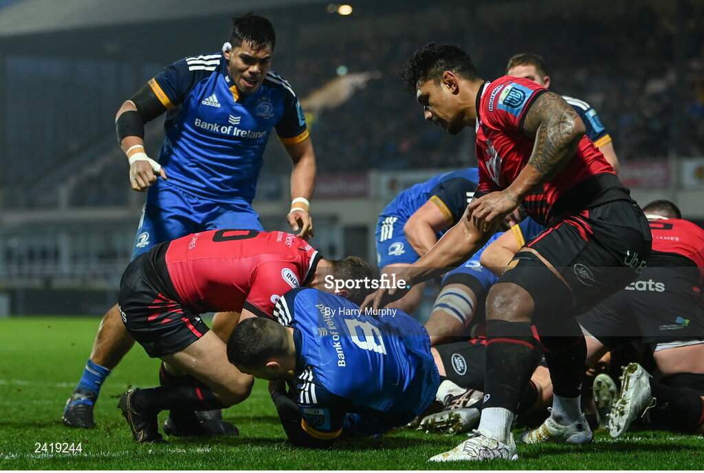 28 January 2023; Max Deegan of Leinster on his way to scoring his side's first try despite the tackle of Jarrod Evans of Cardiff during the United Rugby Championship match between Leinster and Cardiff at RDS Arena in Dublin. Photo by Harry Murphy/Sportsfile