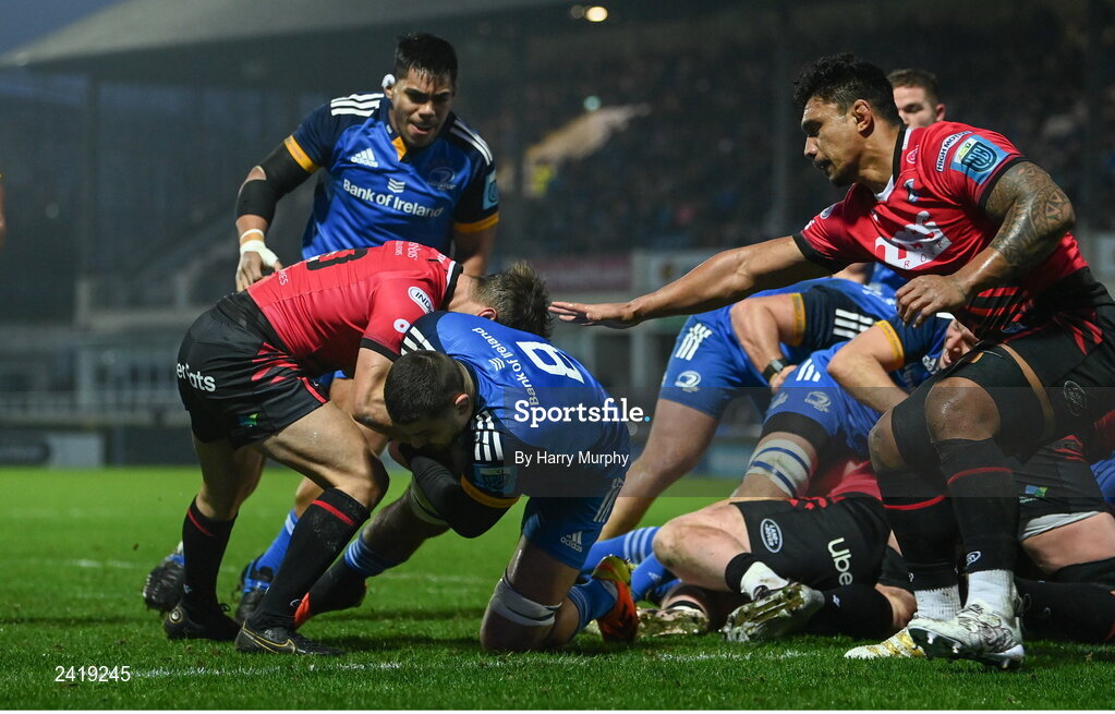 28 January 2023; Max Deegan of Leinster on his way to scoring his side's first try despite the tackle of Jarrod Evans of Cardiff during the United Rugby Championship match between Leinster and Cardiff at RDS Arena in Dublin. Photo by Harry Murphy/Sportsfile