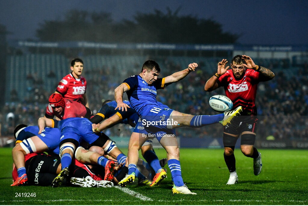 28 January 2023; Luke McGrath of Leinster kicks clear from Josh Turnbull of Cardiff during the United Rugby Championship match between Leinster and Cardiff at RDS Arena in Dublin. Photo by Ben McShane/Sportsfile