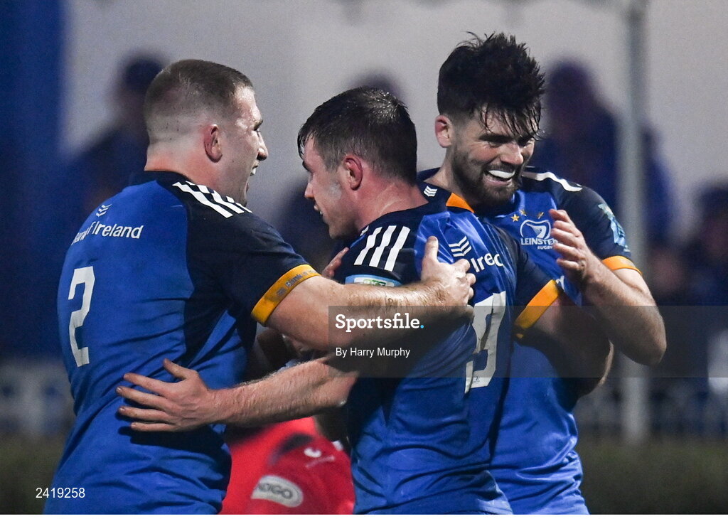 28 January 2023; Luke McGrath of Leinster, 9, celebrates with teammates John McKee and Harry Byrne after scoring his side's second try during the United Rugby Championship match between Leinster and Cardiff at RDS Arena in Dublin. Photo by Harry Murphy/Sportsfile