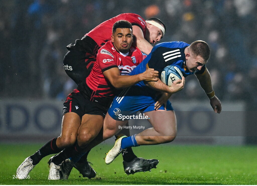 28 January 2023; John McKee of Leinster is tackled by Seb Davies, left, and Ben Thomas of Cardiff during the United Rugby Championship match between Leinster and Cardiff at RDS Arena in Dublin. Photo by Harry Murphy/Sportsfile