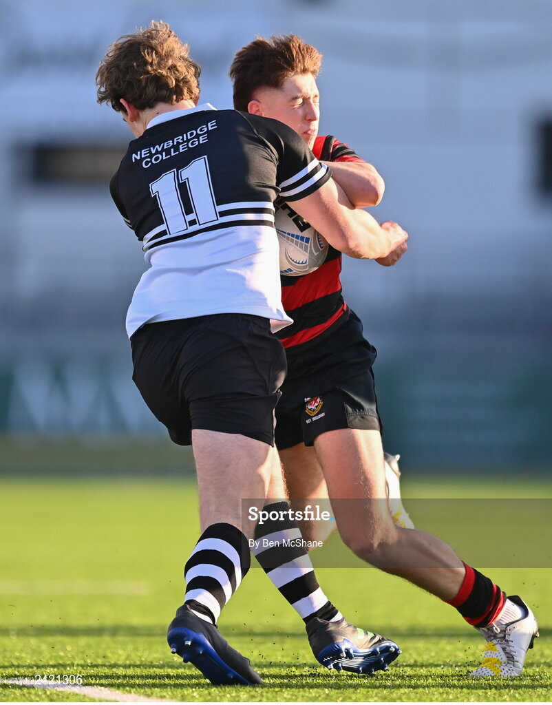 31 January 2023; Jack Campion of Kilkenny College is tackled by Adam Larkin Smithers of Newbridge College during the Bank of Ireland Leinster Rugby Schools Senior Cup First Round match between Newbridge College and Kilkenny College at Energia Park in Dublin. Photo by Ben McShane/Sportsfile