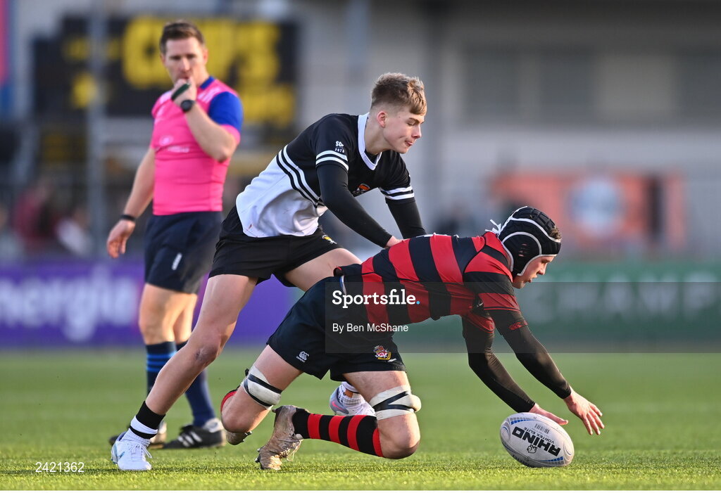 31 January 2023; Harry Peavoy of Kilkenny College dives for a loose ball ahead of Glenn O'Rourke of Kilkenny College during the Bank of Ireland Leinster Rugby Schools Senior Cup First Round match between Newbridge College and Kilkenny College at Energia Park in Dublin. Photo by Ben McShane/Sportsfile