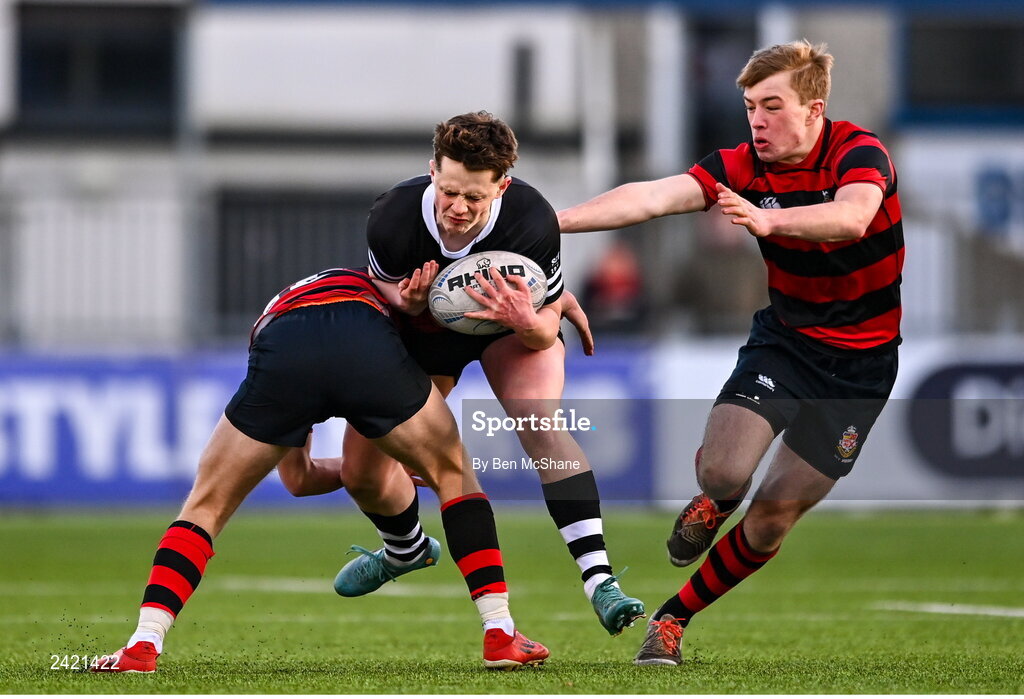 31 January 2023; Rory Allen of Newbridge College is tackled by Ivor Fenton, left, and Jasper Kelly of Kilkenny College during the Bank of Ireland Leinster Rugby Schools Senior Cup First Round match between Newbridge College and Kilkenny College at Energia Park in Dublin. Photo by Ben McShane/Sportsfile