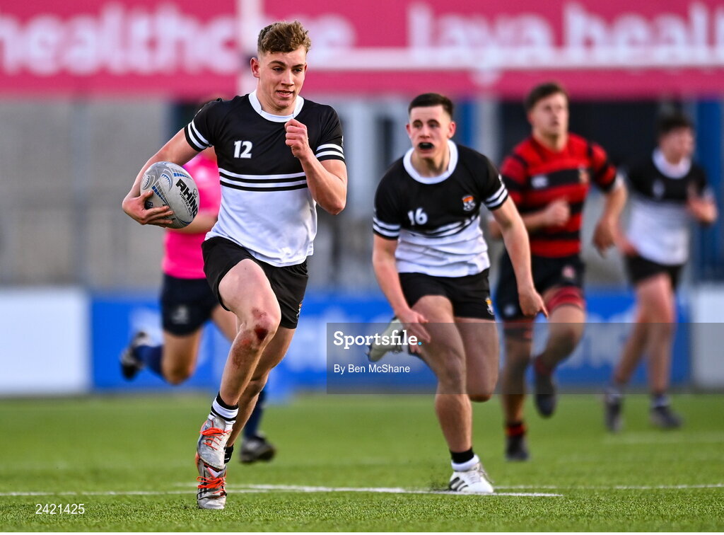31 January 2023; Paddy Taylor of Newbridge College makes a break on his way to scoring a try during the Bank of Ireland Leinster Rugby Schools Senior Cup First Round match between Newbridge College and Kilkenny College at Energia Park in Dublin. Photo by Ben McShane/Sportsfile