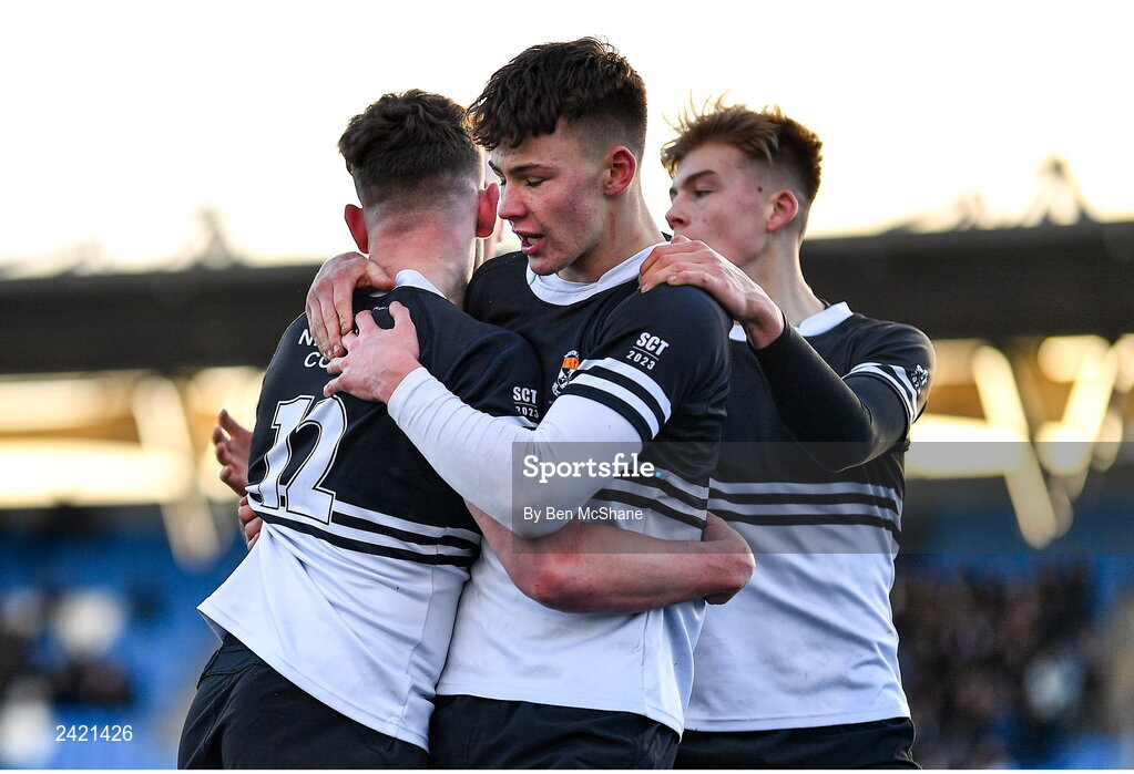 31 January 2023; Paddy Taylor of Newbridge College, 12, celebrates with teammates after scoring a try for their side during the Bank of Ireland Leinster Rugby Schools Senior Cup First Round match between Newbridge College and Kilkenny College at Energia Park in Dublin. Photo by Ben McShane/Sportsfile