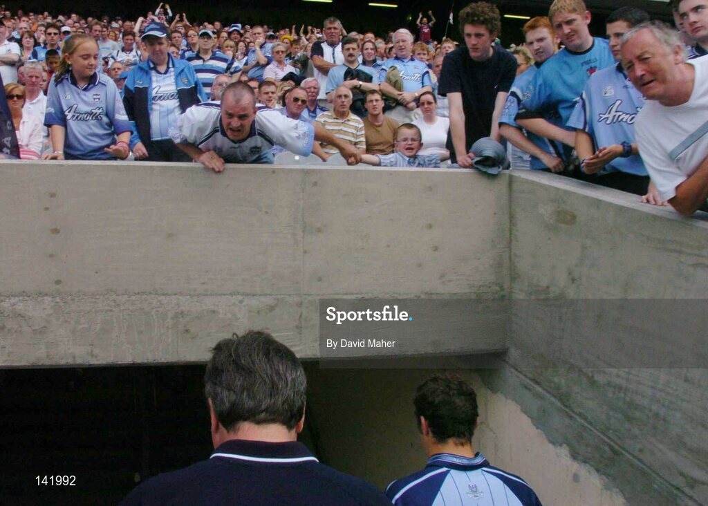 6 June 2004; Angry Dublin supporters voice their opinions to Dublin manager Tommy Lyons , bottom of picture, as he leaves the pitch after defeat to Westmeath. Bank of Ireland Leinster Senior Football Championship, Dublin v Westmeath, Croke Park, Dublin. Picture credit; David Maher / SPORTSFILE