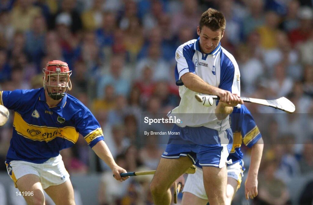 6 June 2004; Dan Shanahan, Waterford, scores his sides first goal despite the attentions of Diarmaid Fitzgerald, Tipperary. Guinness Munster Senior Hurling Championship semi-final, Tipperary v Waterford, Pairc Ui Chaoimh, Cork. Picture credit; Brendan Moran / SPORTSFILE
