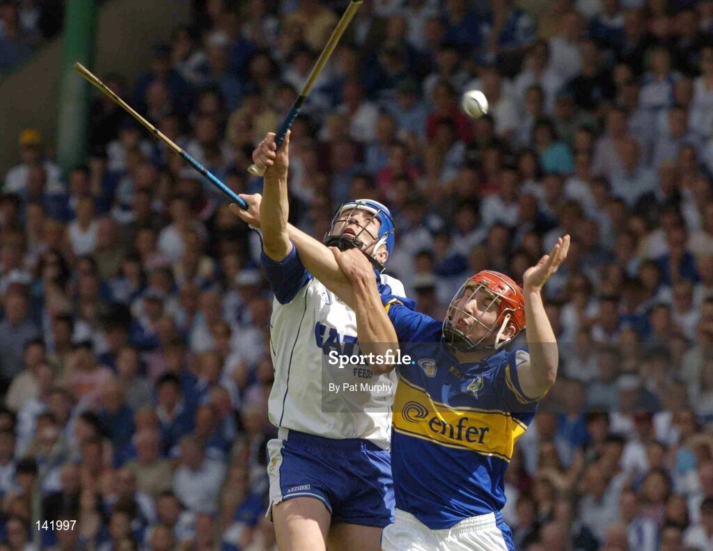 6 June 2004; John Devane, Tipperary, in action against Declan Prendergast, Waterford. Guinness Munster Senior Hurling Championship Semi-Final, Tipperary v Waterford, Pairc Ui Chaoimh, Cork. Picture credit; Pat Murphy / SPORTSFILE