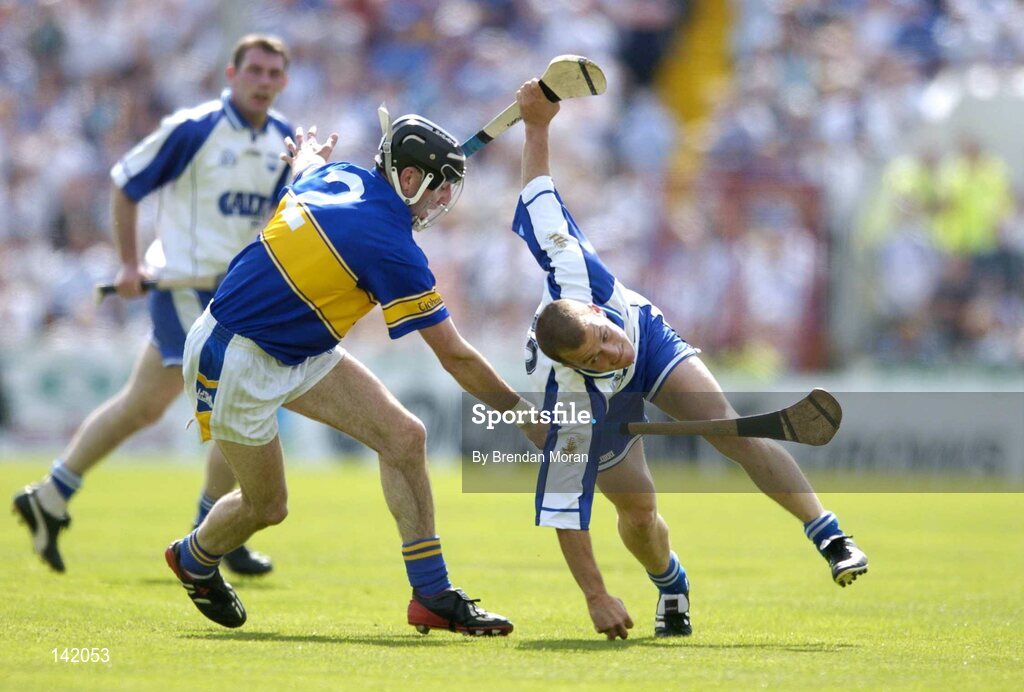 6 June 2004; Eoin McGrath, Waterford, in action against Thomas Costello, Tipperary. Guinness Munster Senior Hurling Championship semi-final, Tipperary v Waterford, Pairc Ui Chaoimh, Cork. Picture credit; Brendan Moran / SPORTSFILE