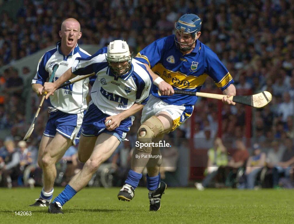 6 June 2004; Paul O'Brien, Waterford, in action against Tipperary's Martin Maher. Guinness Munster Senior Hurling Championship Semi-Final, Tipperary v Waterford, Pairc Ui Chaoimh, Cork. Picture credit; Pat Murphy / SPORTSFILE