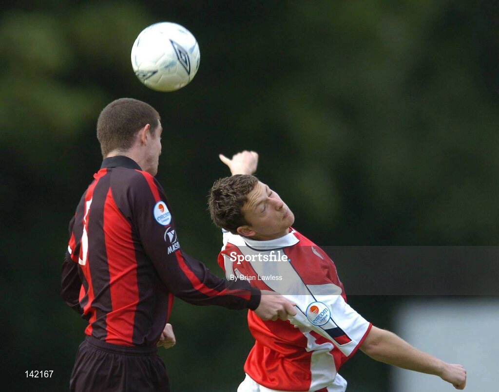 8 June 2004; Jimmi Lee Jones, St. Patrick's Athletic, in action against Barry Ferguson, Longford Town. eircom League, Premier Division, Richmond Park, Dublin. Picture credit; Brian Lawless / SPORTSFILE