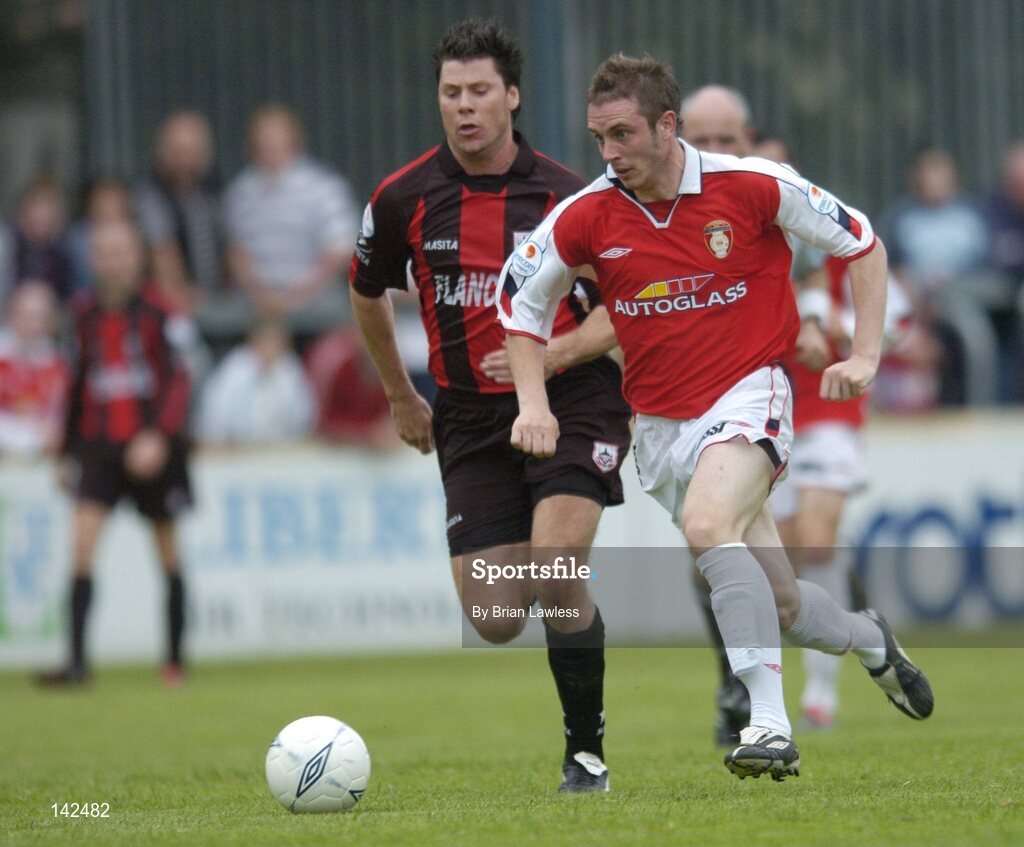 8 June 2004; Aidan O'Keeffe, St. Patrick's Athletic, in action against Dean Fitzgerald, Longford Town. eircom League, Premier Division, St. Patrick's Athletic v Longford, Richmond Park, Dublin. Picture credit; Brian Lawless / SPORTSFILE