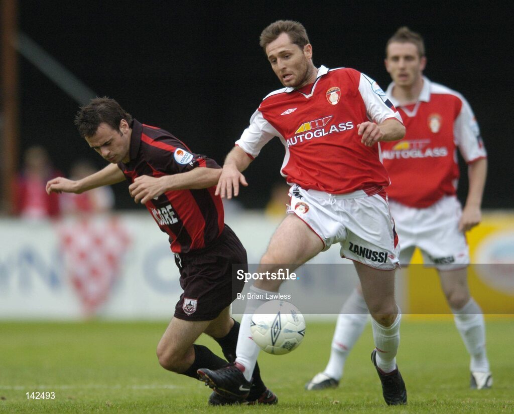 8 June 2004; Des Byrne, St. Patrick's Athletic, in action against John Martin, Longford Town. eircom League, Premier Division, St. Patrick's Athletic v Longford, Richmond Park, Dublin. Picture credit; Brian Lawless / SPORTSFILE