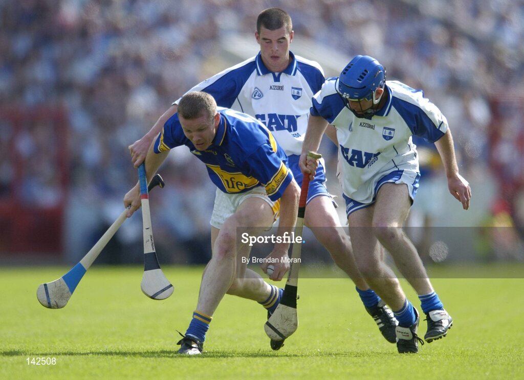 6 June 2004; Conor Gleeson, Tipperary, in action against Brian Phelan and Michael Walsh, right, Waterford. Guinness Munster Senior Hurling Championship semi-final, Tipperary v Waterford, Pairc Ui Chaoimh, Cork. Picture credit; Brendan Moran / SPORTSFILE