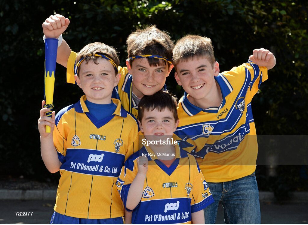 18 August 2013; Clare supporters Ronan, seven years, Eoin, nine, Darren, four, and Shane Fitzpatrick, eleven, from Doolin, on their way to the game. GAA Hurling All-Ireland Senior Championship, Semi-Final, Limerick v Clare, Croke Park, Dublin. Picture credit: Ray McManus / SPORTSFILE