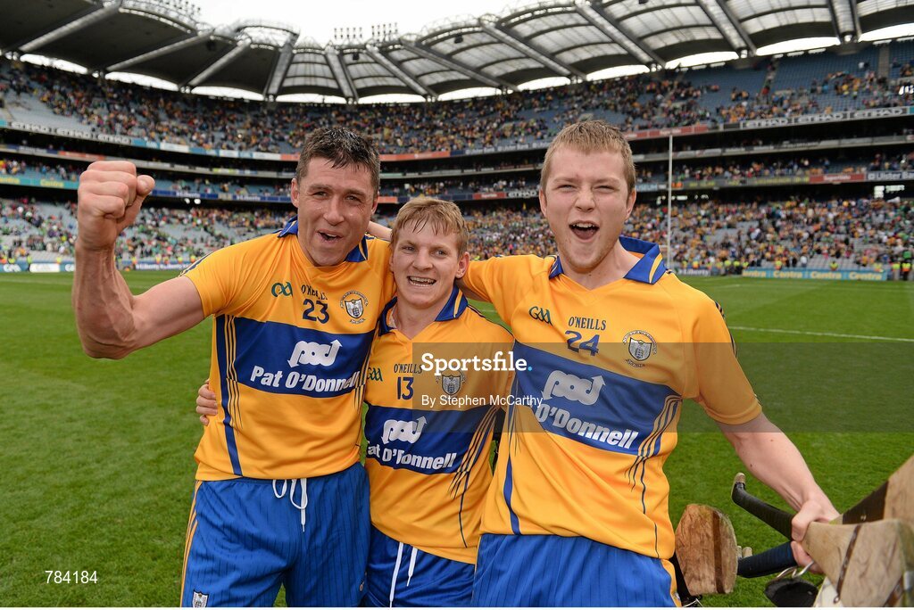 18 August 2013; Clare players, from left, Fergal Lynch, Pásraic Collins and Aaron Cunningham celebrate their side's victory. GAA Hurling All-Ireland Senior Championship, Semi-Final, Limerick v Clare, Croke Park, Dublin. Picture credit: Stephen McCarthy / SPORTSFILE