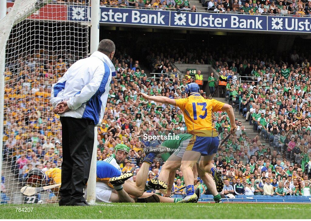 18 August 2013; The sliothar ends up in the Limerick net as Clare's Darach Honan closes in with Limerick's Tom Condon and goalkeeper Nickie Quaid. GAA Hurling All-Ireland Senior Championship, Semi-Final, Limerick v Clare, Croke Park, Dublin. Picture credit: Brendan Moran / SPORTSFILE