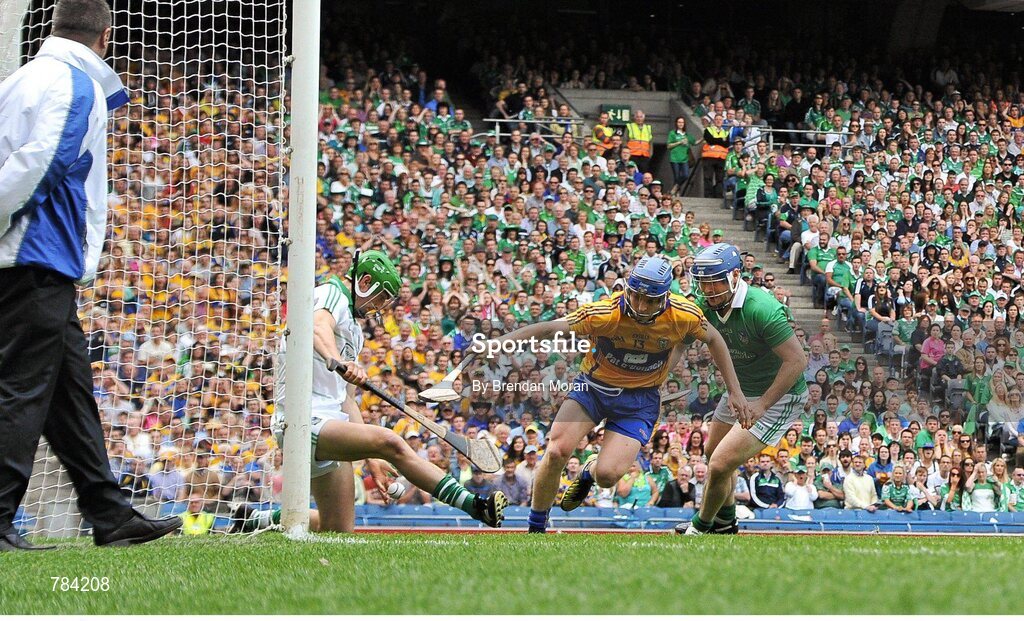 18 August 2013; The sliothar goes through the legs of Limerick goalkeeper Nickie Quaid before ending up in the net for Clare's only goal as Clare's Pádraic Collins and Limerick's Richie McCarthy close in. GAA Hurling All-Ireland Senior Championship, Semi-Final, Limerick v Clare, Croke Park, Dublin. Picture credit: Brendan Moran / SPORTSFILE