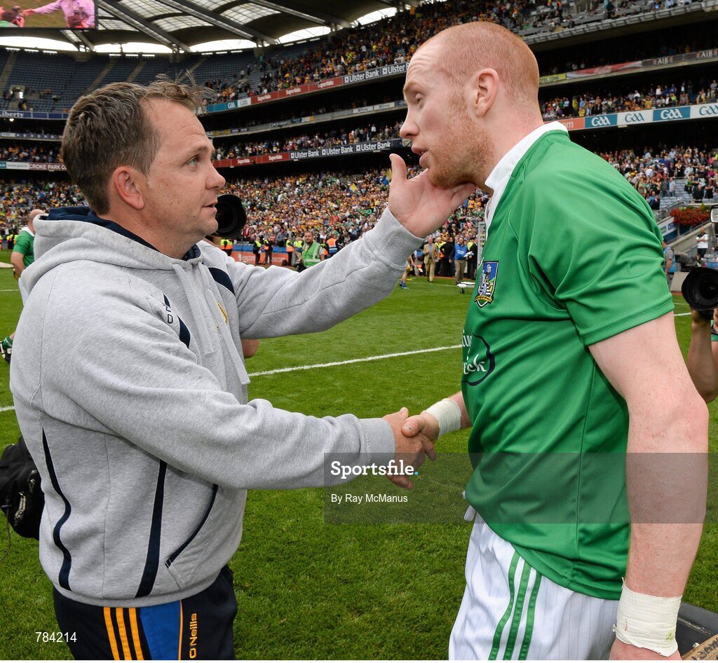 18 August 2013; Clare manager Davy Fitzgerald comforts Limerick's Wayne McNamara after the game. GAA Hurling All-Ireland Senior Championship, Semi-Final, Limerick v Clare, Croke Park, Dublin. Picture credit: Ray McManus / SPORTSFILE