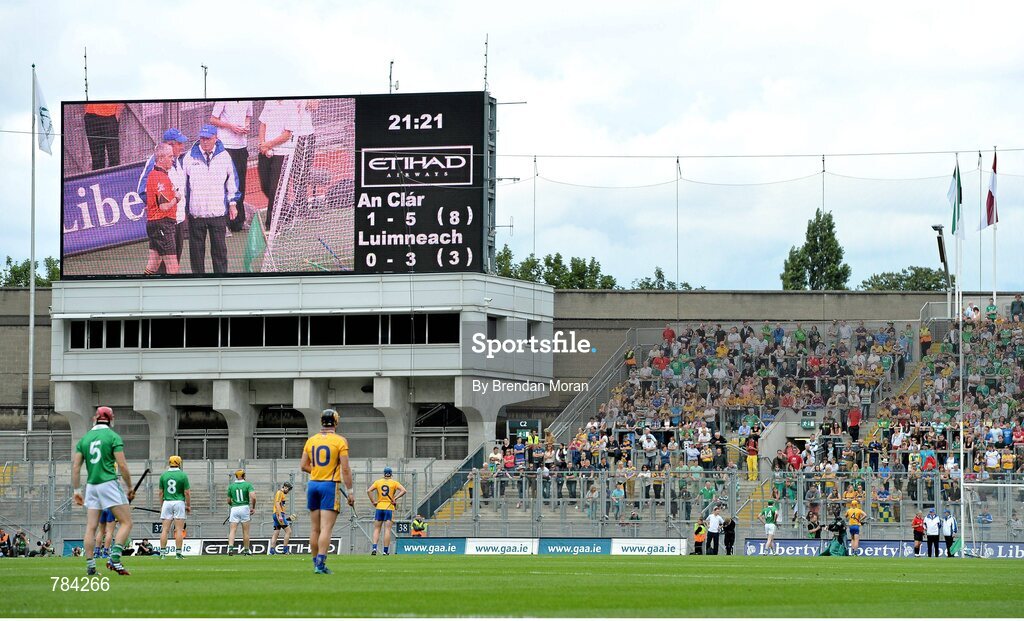 18 August 2013; Referee Johnny Ryan consults with his umpires before awarding Limerick their 4th point of the day after the 'Hawk-eye' score detection system was suspended from use in the senior game, following an inconsistant graphic generated by 'Hawk-eye' in the minor game. GAA Hurling All-Ireland Senior Championship, Semi-Final, Limerick v Clare, Croke Park, Dublin. Picture credit: Brendan Moran / SPORTSFILE