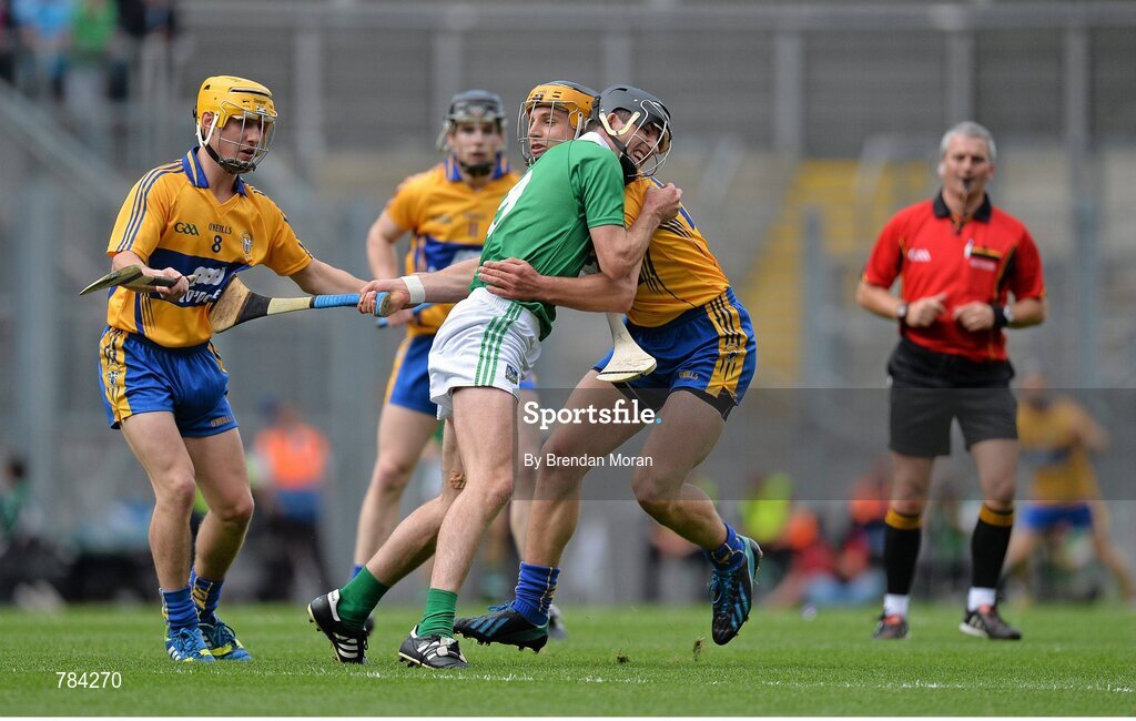 18 August 2013; Donal O'Grady, Limerick, is tackled by Conor Ryan, Clare. GAA Hurling All-Ireland Senior Championship, Semi-Final, Limerick v Clare, Croke Park, Dublin. Picture credit: Brendan Moran / SPORTSFILE