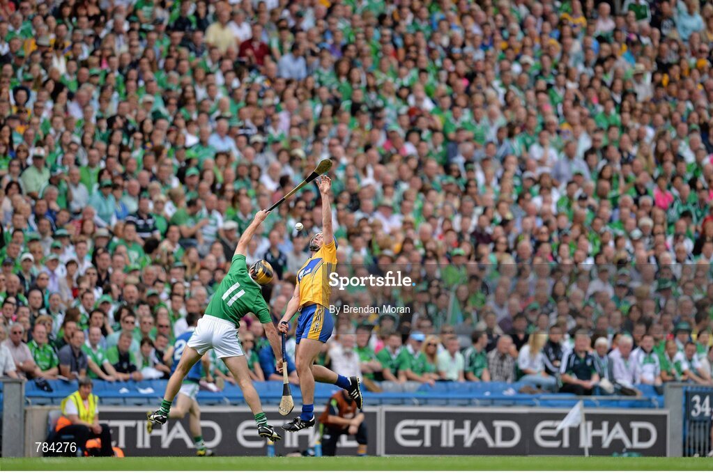 18 August 2013; Conor Ryan, Clare, and James Ryan, Limerick, contest a dropping ball during the game. GAA Hurling All-Ireland Senior Championship, Semi-Final, Limerick v Clare, Croke Park, Dublin. Picture credit: Brendan Moran / SPORTSFILE
